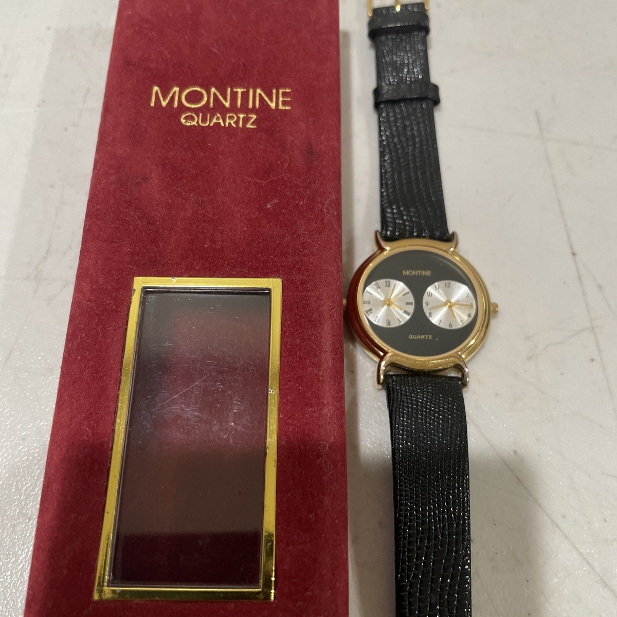 Montine Dual Time Round Gold Tone Case Black Leather Band 