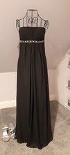Black, full length strapless evening dress with diamante detail. Back zipper.