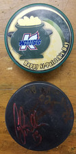 Kalamazoo Wings Hockey Pucks - Happy St. Pat's and Black Game Puck - Used