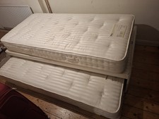 Trundle bed including both mattresses. Excellent condition.