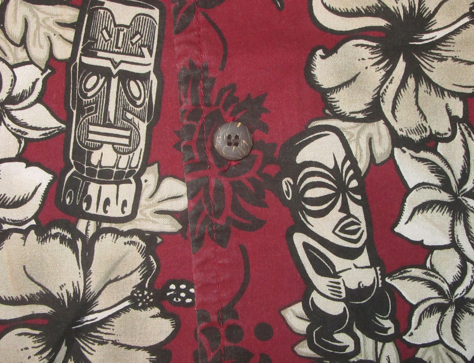 Tiki heads floral button-front Hawaiian shirt size MEDIUM or LARGE by Puritan