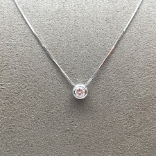 GIROCOLLO RECARLO, punto luce con diamante ct 0,235 e oro bianco 18 Kt ( 750 )