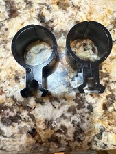 SEE THROUGH HIGH VERTICAL 1 INCH SCOPE RINGS. OLD NEW STOCK.
