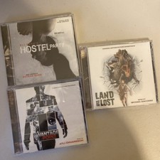 Sound Tracks Lot Of 3 Sealed Cds  Land Of The Lost, Vantage Point, Hostle 2