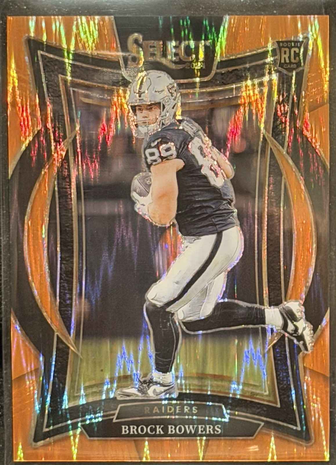 2024 Panini Select - Concourse Brock Bowers #31 Orange Shock Prizm /499 (RC)