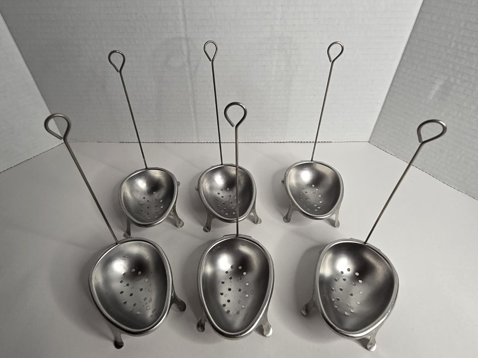 Six 1940s French-style wire egg dippers/poachers that look like tiny sculptural art objects — genuinely rare, farmhouse-beautiful, and straight out of a Parisian country kitchen.