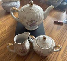 TEA SET MADE IN JAPAN TEAPOT, CREAMER AMD SUGAR FLORAL WITH GOLD TRIM
