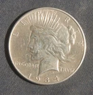 1934 LOWER GRADE PEACE SILVER DOLLAR 90% SILVER LOT 171017