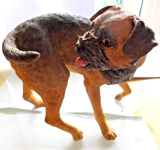 Danbury Mint Border Terrier chasing tail
