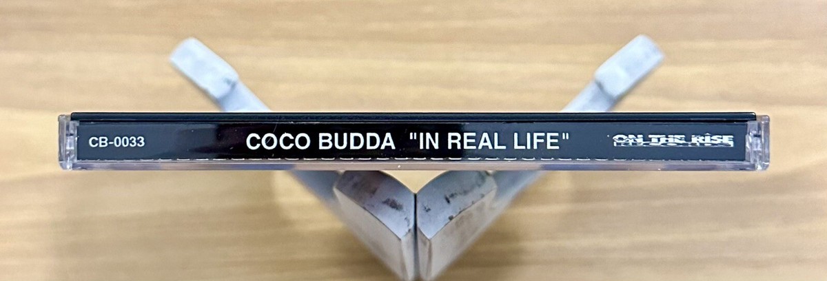 CD ~ Coco Budda ~ “In Real Life” ~ P.A. ~ 15 Tracks ~ 1999 ~ !L 