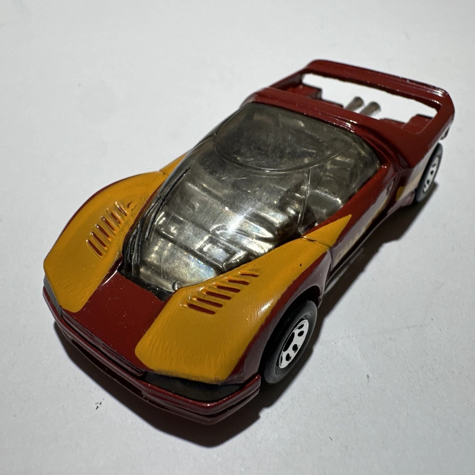 Coche deportivo Quasar Peugeot 1986 vintage rojo amarillo fundido a presión hecho en Macao Foto 3 de 4