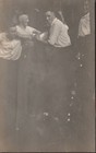 RPPC of a group of men involved in hazing — photo 1