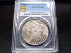 1899 MS65 Morgan Silver Dollar PCGS Certified Gem - White/Gold Shield Holder