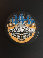 TIM THOMAS  AUTOGRAPHED 2011 S.C.C. BRUINS PUCK  J.S.A. AUTHENTICATED