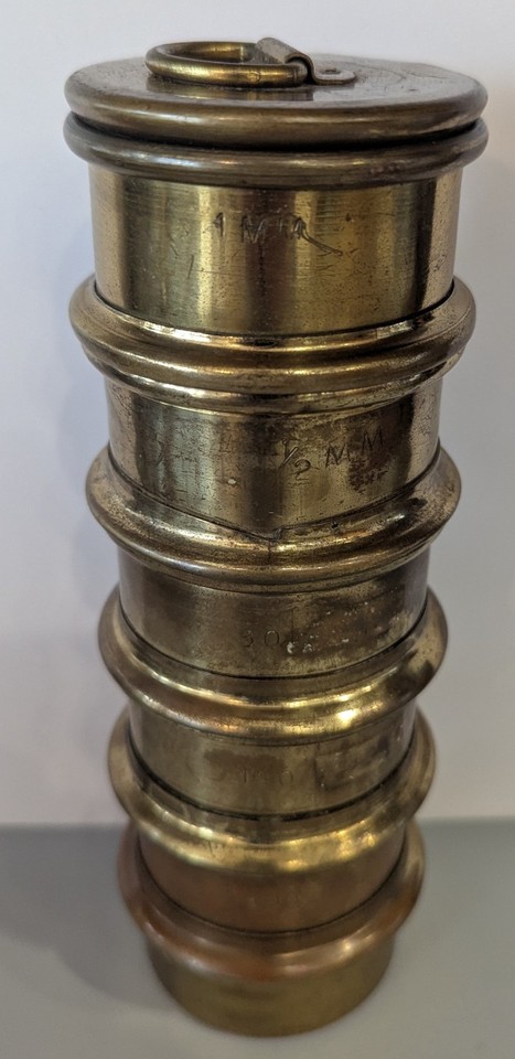 A brass scientific sieve from the golden age of field geology — this is a beautiful desk object as much as it is a piece of scientific history.