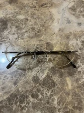 Marchon Airlock 2 - 770/39 RIMLESS EYEGLASSES 47-21-135 color 015 Tortoise