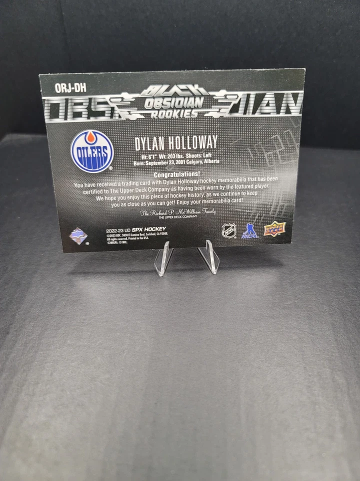 2022-23 Upper Deck SPX Black Obsidian RC Jersey Dylan Holloway #ORJ-DH 166/499 - Image 2 of 2