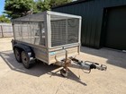 Blue line twin axle cage trailer