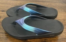 Woman's Oofos Blue Shimmer Slip On Thong Recovery Flip Flops Size 7 EUC