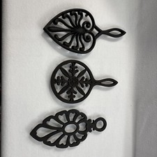 vintage wilton cast iron trivet, cast iron , kitchen ware, hot pad Lot Of 3