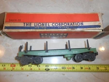 O/O-27 Lionel 3461x-25 Green Automatic Lumber car in box.  The car works
