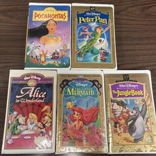 Collection of five Walt Disney Masterpiece Collection VHS tapes.