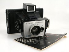 POLAROID SUPER COLORPAK LAND CAMERA W/ MANUAL