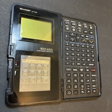 Sharp Wizard OZ-7000 Electronic Organizer Untested / For Parts