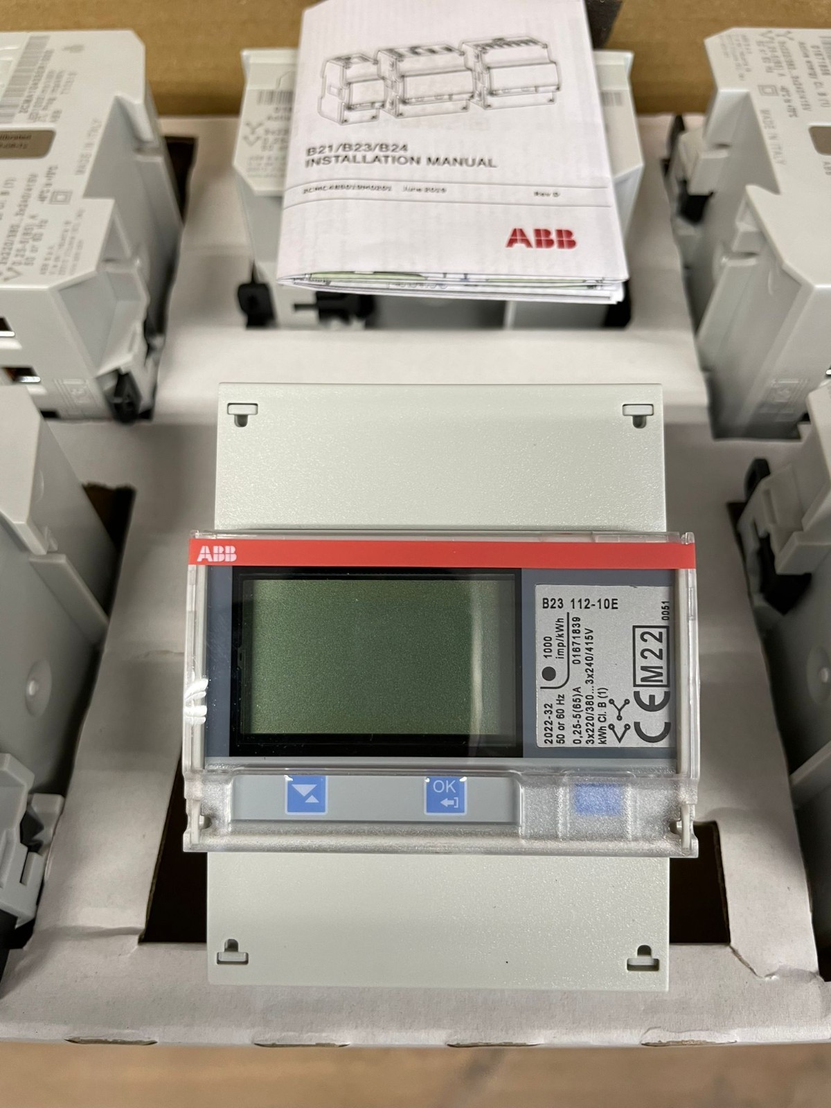 ABB B23 112-10E three-phase energy meters, supplied as a box of 10 units