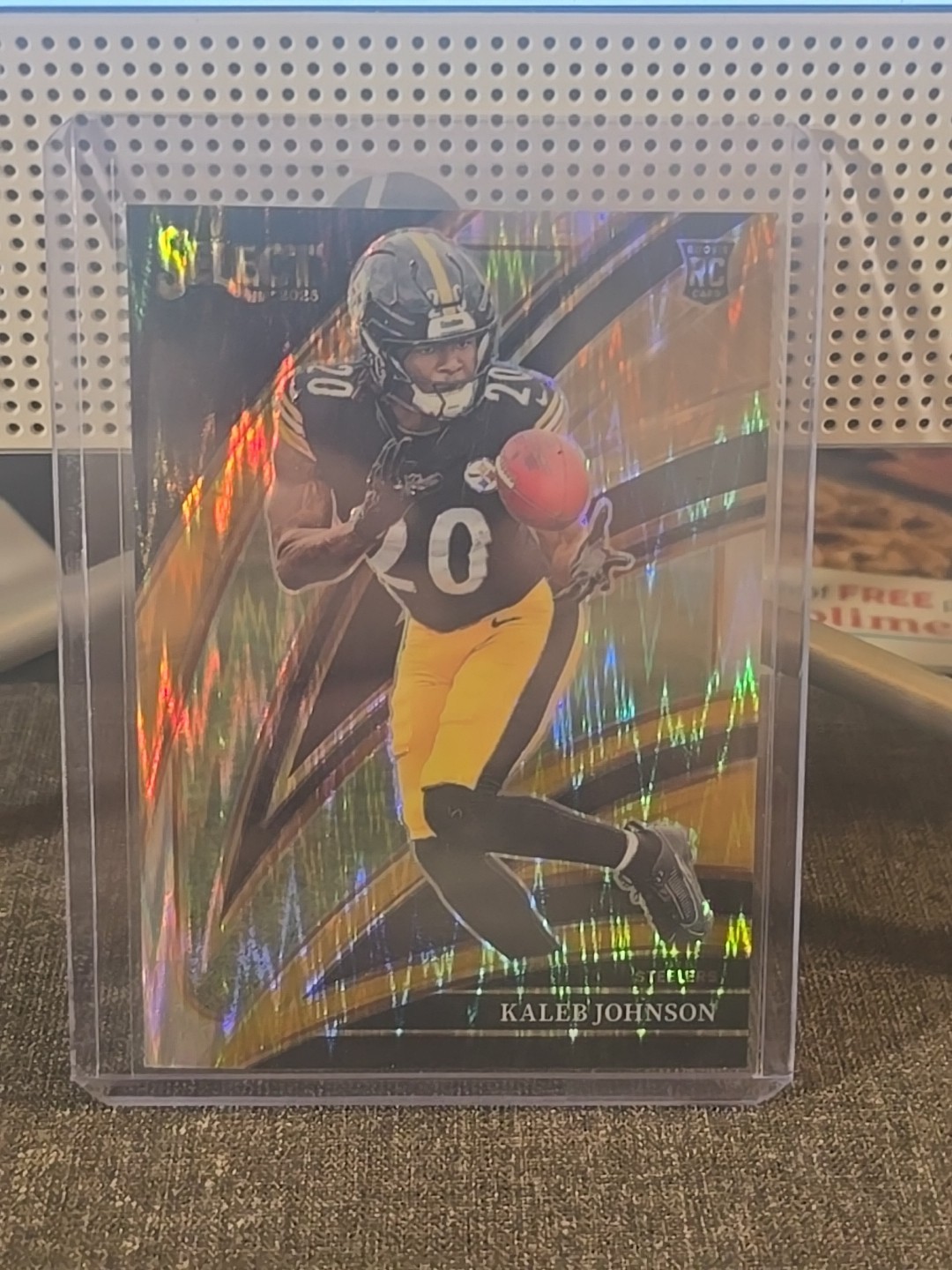 2025 Panini Select - Club Level Kaleb Johnson #252 Black & Gold Shock Prizm (RC)
