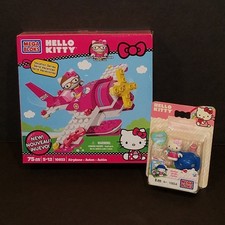 Mega Bloks 2013 Hello Kitty 10933 Airplane Vacation Series y 10854 Garden LEER