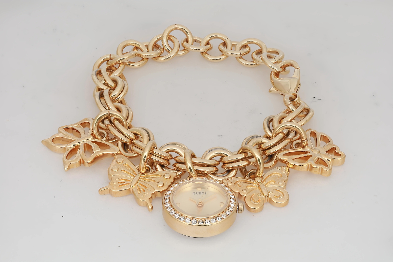 Guess Charm 20mm Gold-Tone Crystal Champagne Dial Ladies Quartz Watch U12568L1