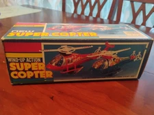 Wind-up action Super Copter Space Shuttle Tin and plastic NIB Korea