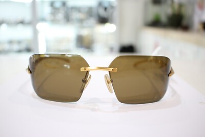 Prada PR A55S Satin Yellow Gold/Dark Brown (15N-01T N) | eBay