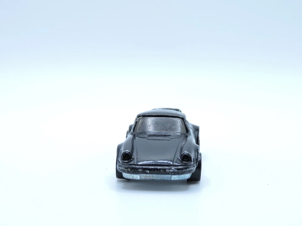 Porsche 911 1988 Hot Wheels Mainline P-911 cupé negro con rueda básica BW dorada de colección Foto 2 de 4