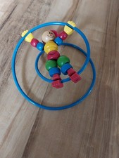 Kinderspielzeug - elastischer Mensch in Spirale - aus Holz - guter Zustand