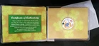 WORLDS LUCKIEST COIN-2003 COLORIZED KENNEDY HALF DOLLAR-7 LUCKY SYMBOLS
