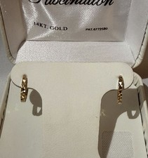 Fascination 14k Yellow Gold 10mm Hoop Earrings Continuous Hoop Closure Round