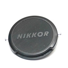 GENUINE OEM BRANDED NIKON NIKKOR 52MM FRONT LENS CAP CHROME BUTTON CLIP ON