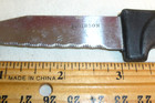 Farberware Three Serrated Stainless Steel Knife Set Black Plastic Handles — photo 3