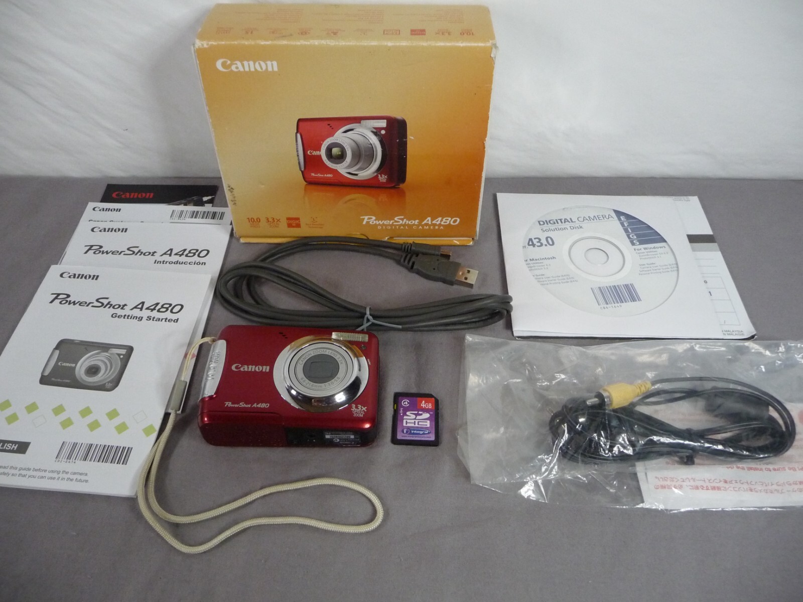 Canon PowerShot A480 10.0MP Digital Camera Red + 4GB SD Card & Box