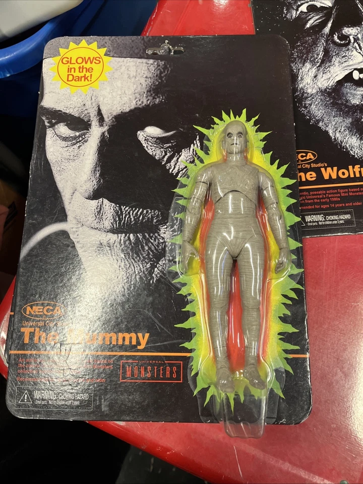 NECA Juego de 3 Monstruos Brillan en la Oscuridad, Hombre Lobo, Momia y Frankenstein (T4 Foto 2 de 4