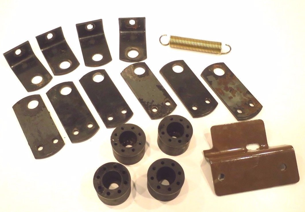 OEM LOT OF MISC. PARTS MOUNT / BUSHINGS / EXTENSION SPRING