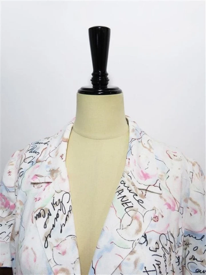 ABRIGO USADO 64278 CHANEL/CC LOGO CAMELIA MEDIA MANGA ACEPTABLE Foto 3 de 4