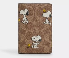 COACH X PEANUTS ID CARD WALLET IN SIGNATURE CANVAS WITH SNOOPY PRINT