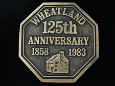 PK11124 VINTAGE 1983  WHEATLAND 125TH ANNIVERSARY  BELT BUCKLE