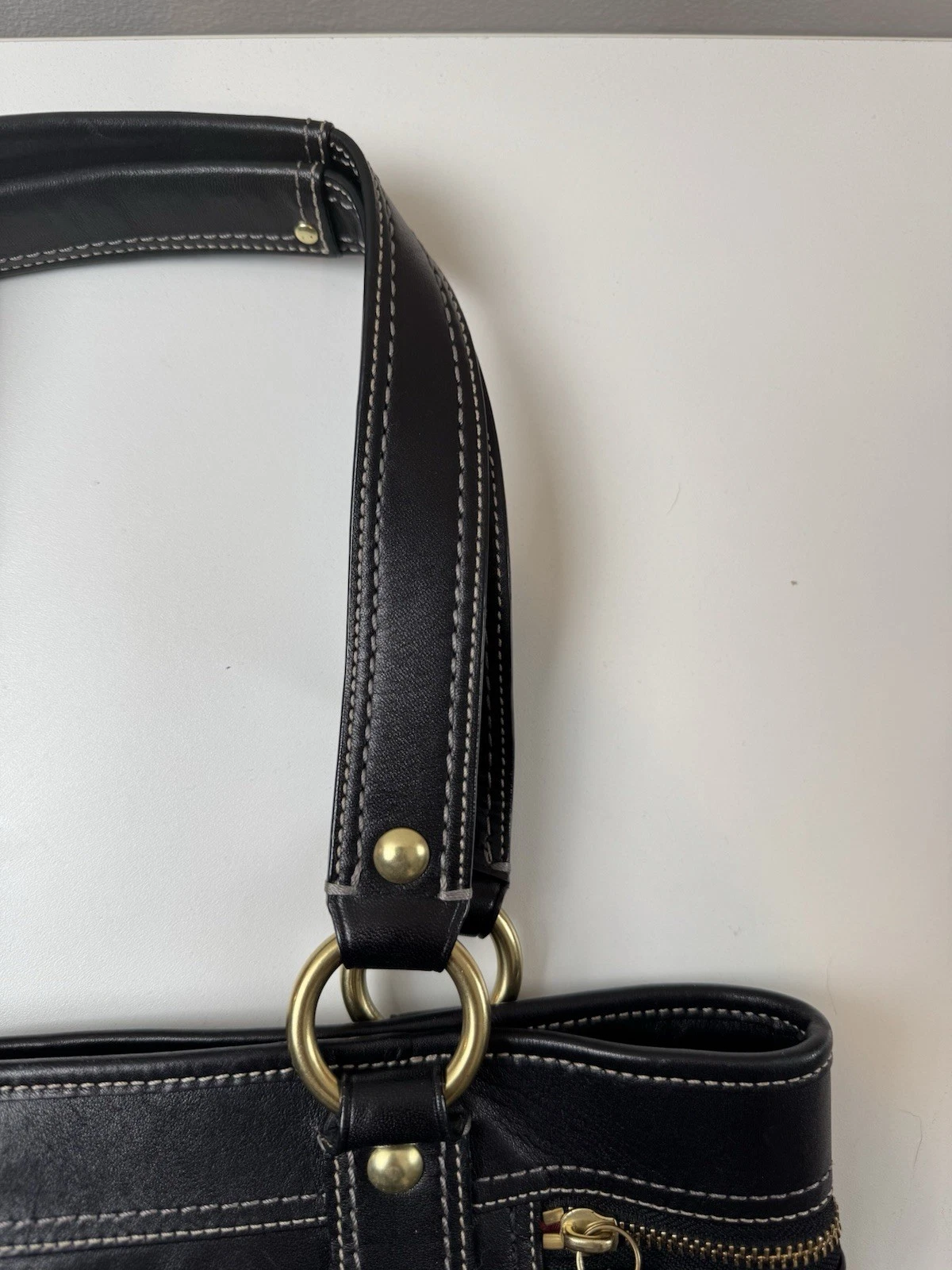 Borsa a tracolla Coach Gigi in pelle nera con tasca a chiusura girevole tracolla lunga *DESCRIZIONE*