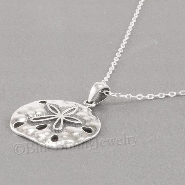 Sterling silver sand shop dollar necklace