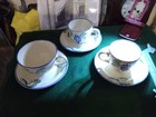 Poole Pottery Cups And Saucers