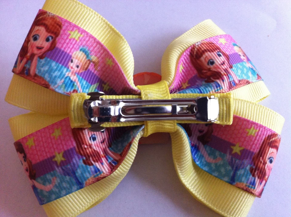 Moño de pelo para niñas de 4" de ancho Sofía la primera cinta amarilla Oona pasador francés Foto 3 de 3
